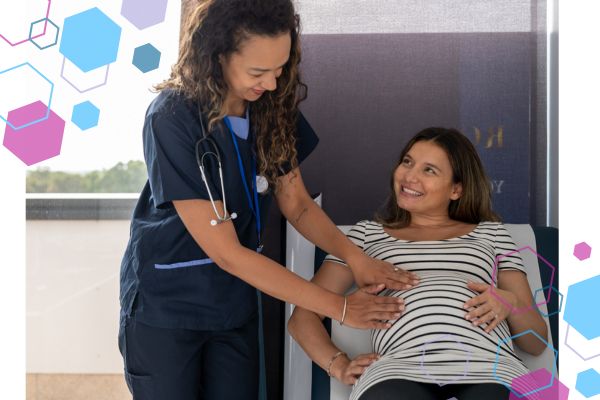 CubCare blog post front cover. An picture of a pregnant woman and a midwife. The pregnant woman is reclining on an examination bed whilst the midwife palpates her abdomen. Both women are smiling at each other. CubCare blog post front cover. An picture of a pregnant woman and a midwife. The pregnant woman is reclining on an examination bed whilst the midwife palpates her abdomen. Both women are smiling at each other.