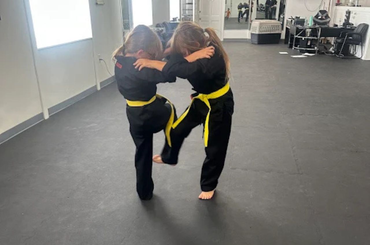 Martial arts instructor with kids