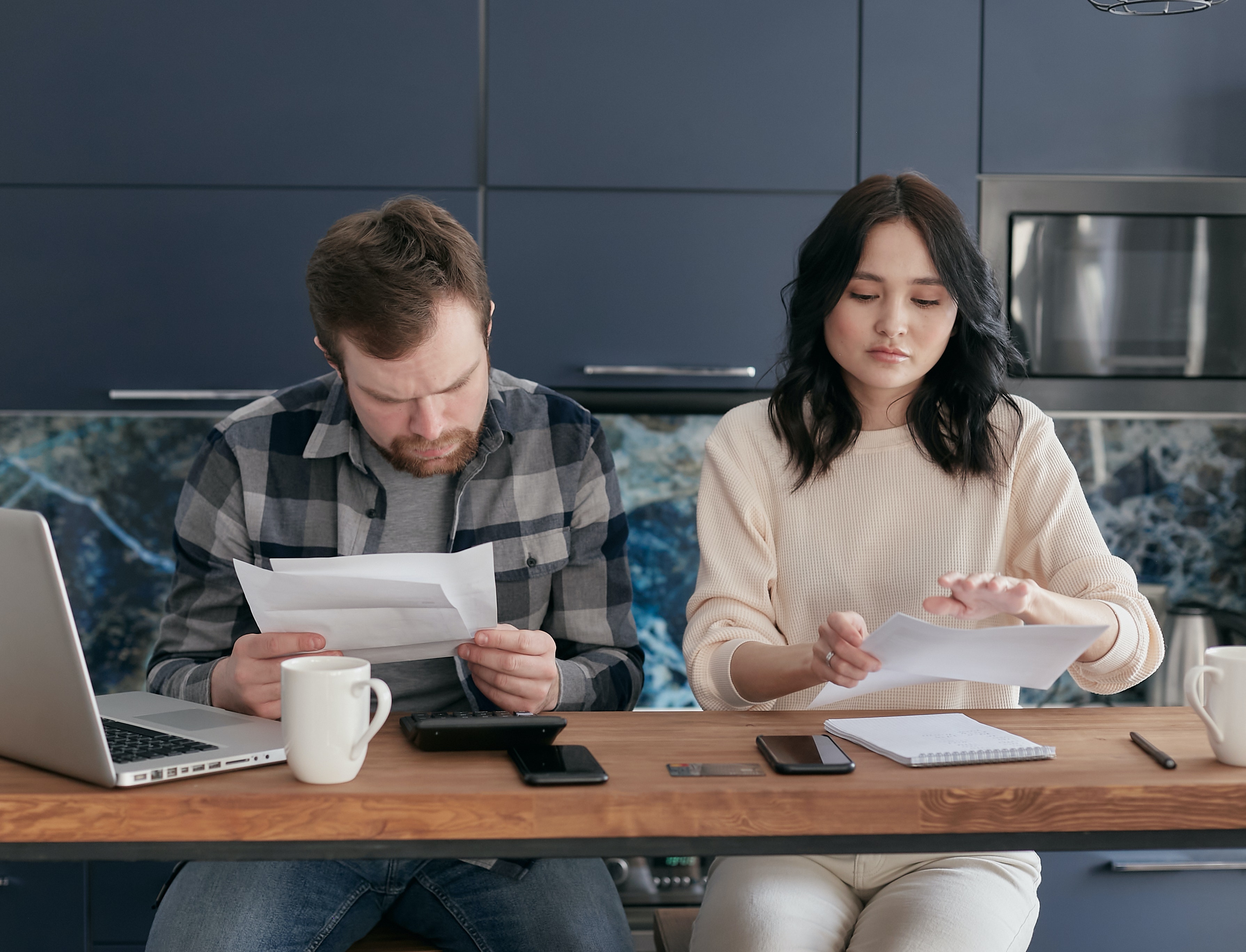 Couple looking at bills