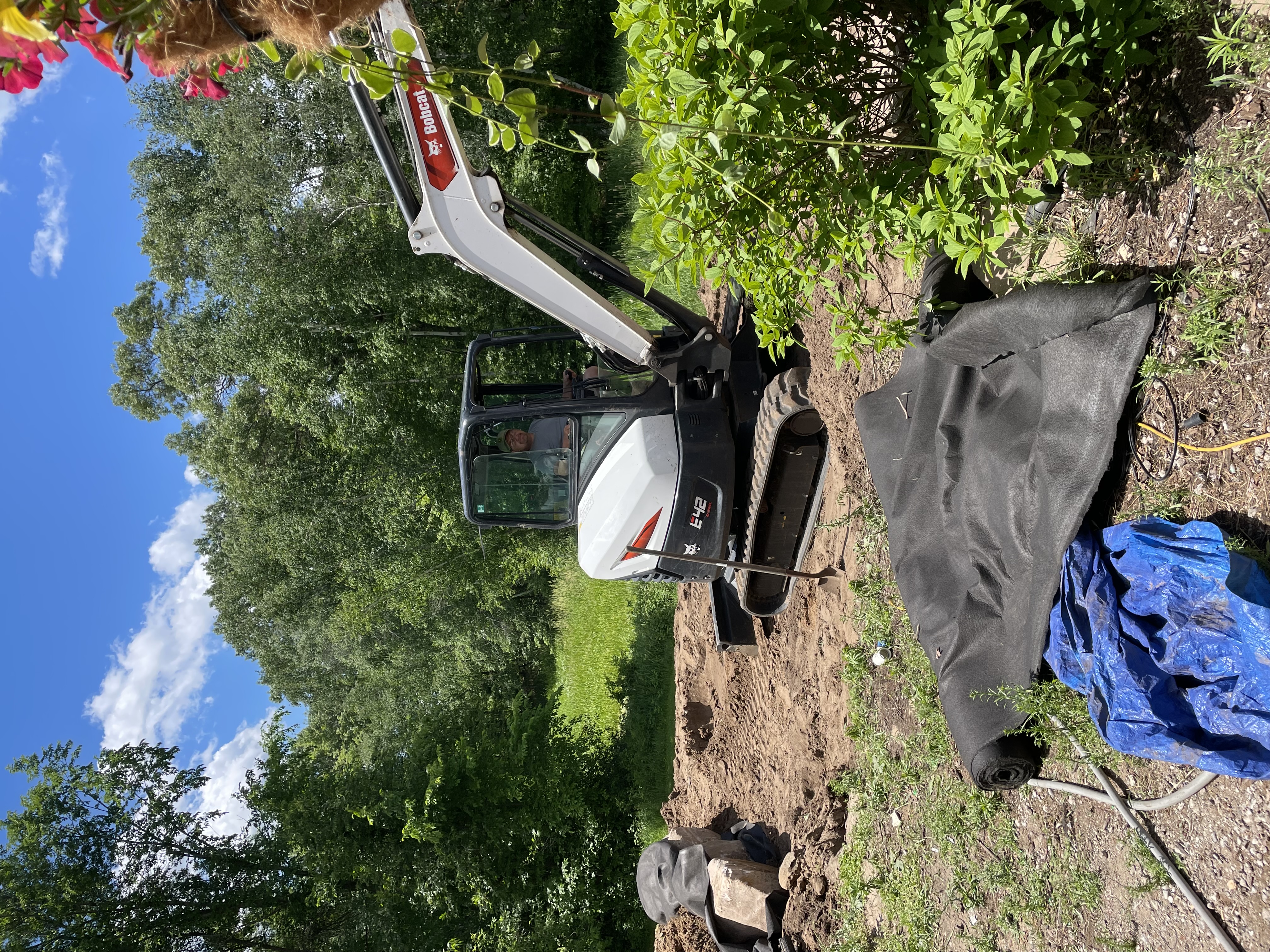 Professional landscaper doing excavating and site prep in Cambridge, MN Professional landscaper doing excavating and site prep in Cambridge, MN