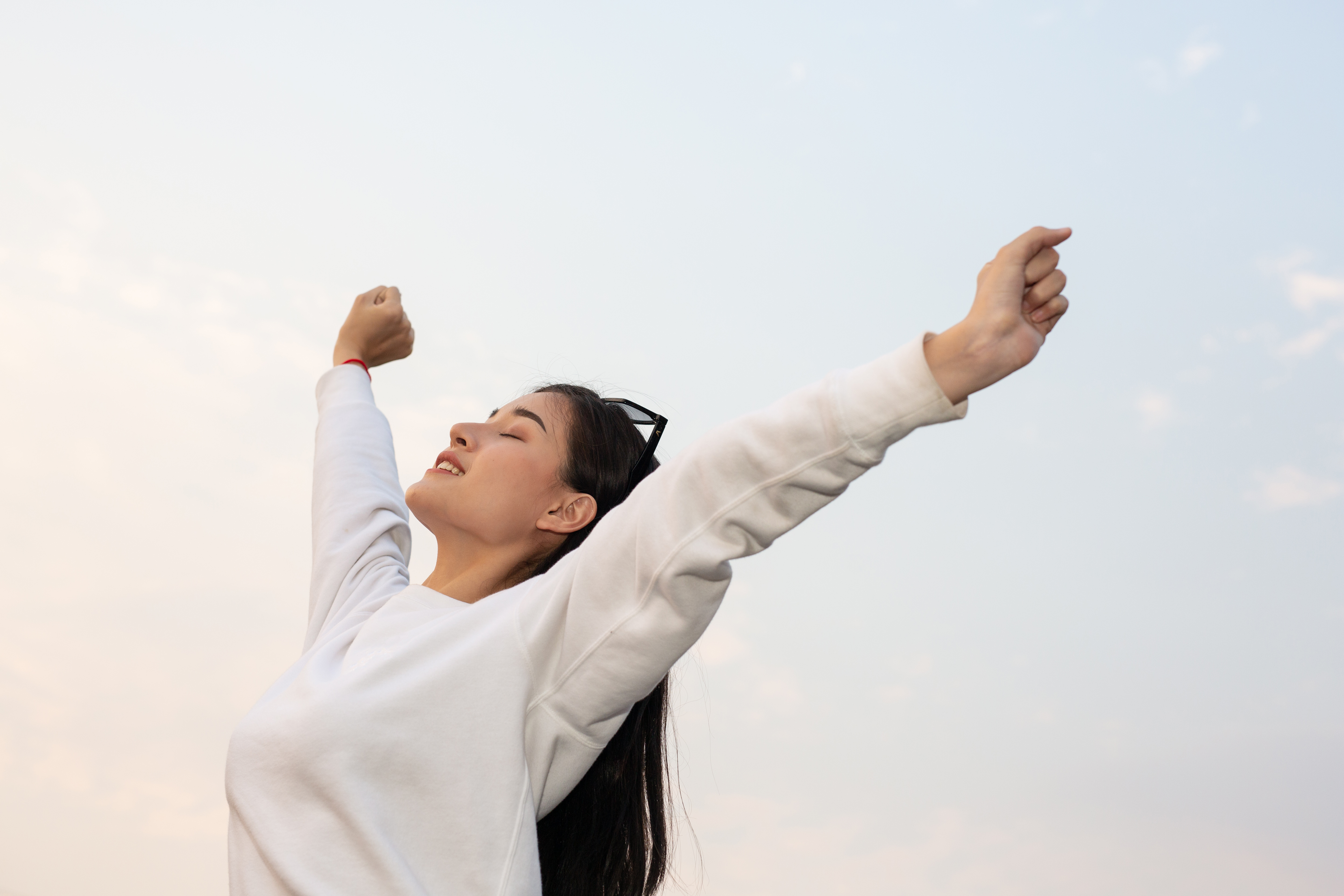 Woman opening her arms