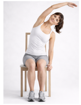 Woman with arm up and stretched to the side Woman with arm up and stretched to the side