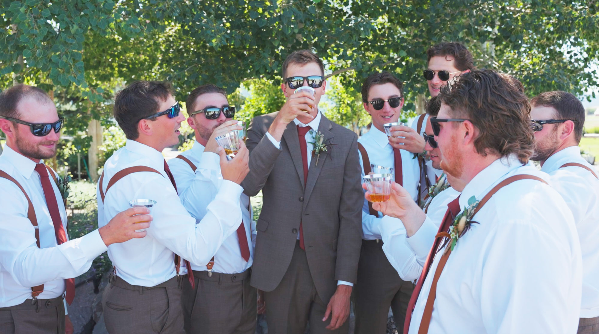 groomsmen wearing sunglasses for summer wedding