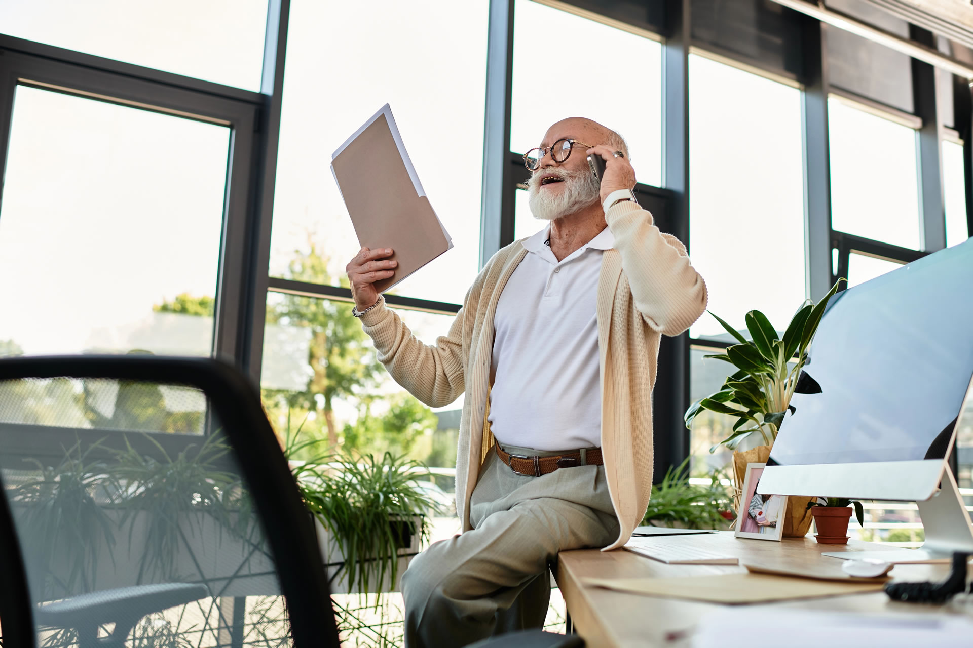 polished-senior-executive-leads-call-demonstrating-style-leadership-modern-workspace polished-senior-executive-leads-call-demonstrating-style-leadership-modern-workspace