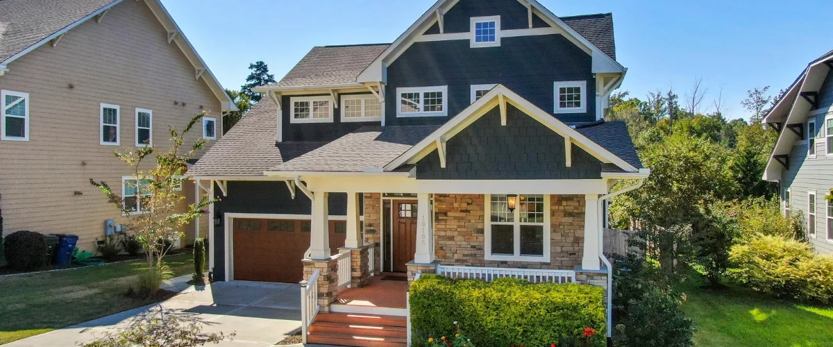 Clean residential home exterior after professional pressure washing service