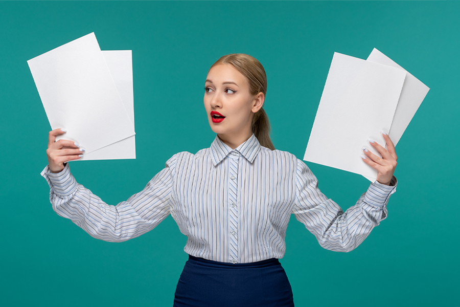Business Woman holding up marketing agency agreements Business Woman holding up marketing agency agreements