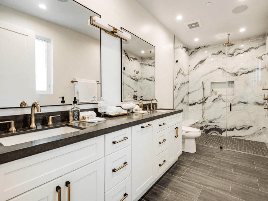 a bathroom remodeling project featuring a modern design with white cabinetry, a large mirror, and stylish fixtures.