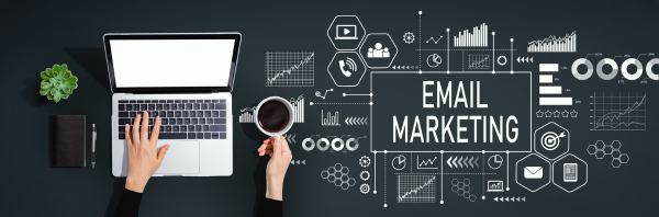 Email marketing concept with person using laptop computer Email marketing concept with person using laptop computer