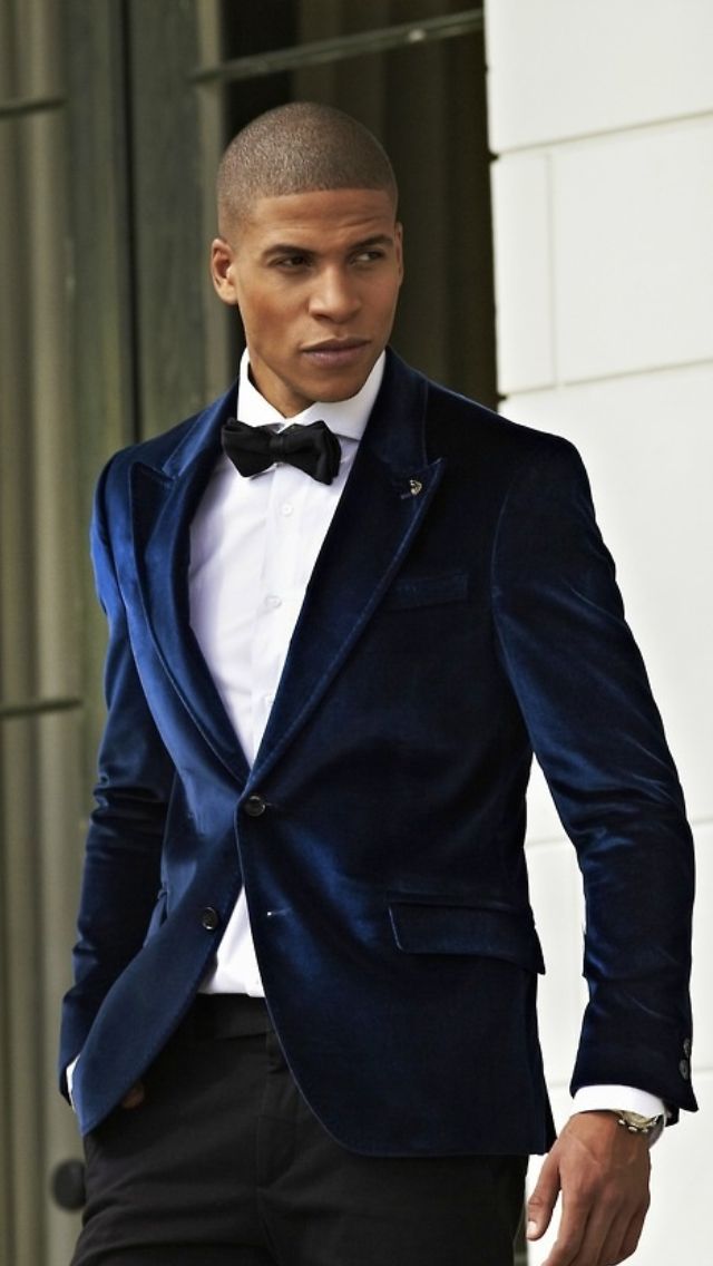 A velvet smoking jacket in dark blue with compliment dress pants and dress shirt. A velvet smoking jacket in dark blue with compliment dress pants and dress shirt.