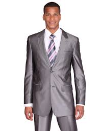A man wearing a grey sharkskin suit with a very apparent sheen A man wearing a grey sharkskin suit with a very apparent sheen