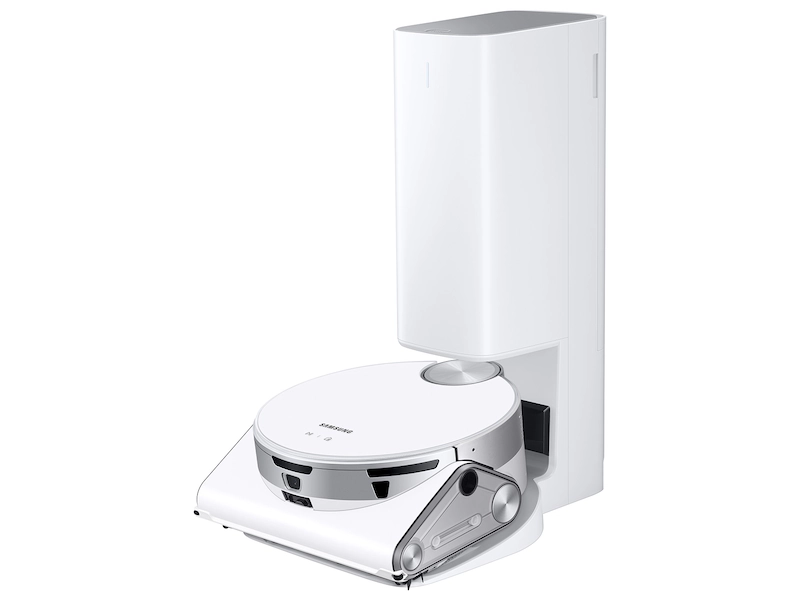 white robot vacuum cleaner in its white charging base.