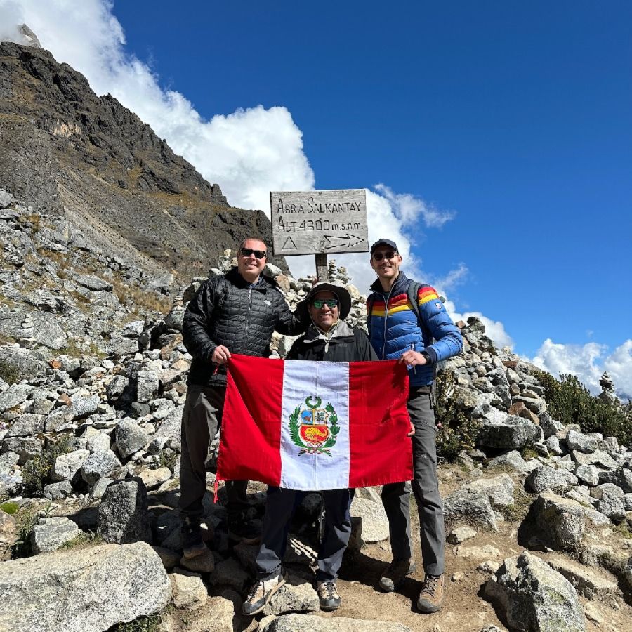 3 people standing on Salkantay trek Summit