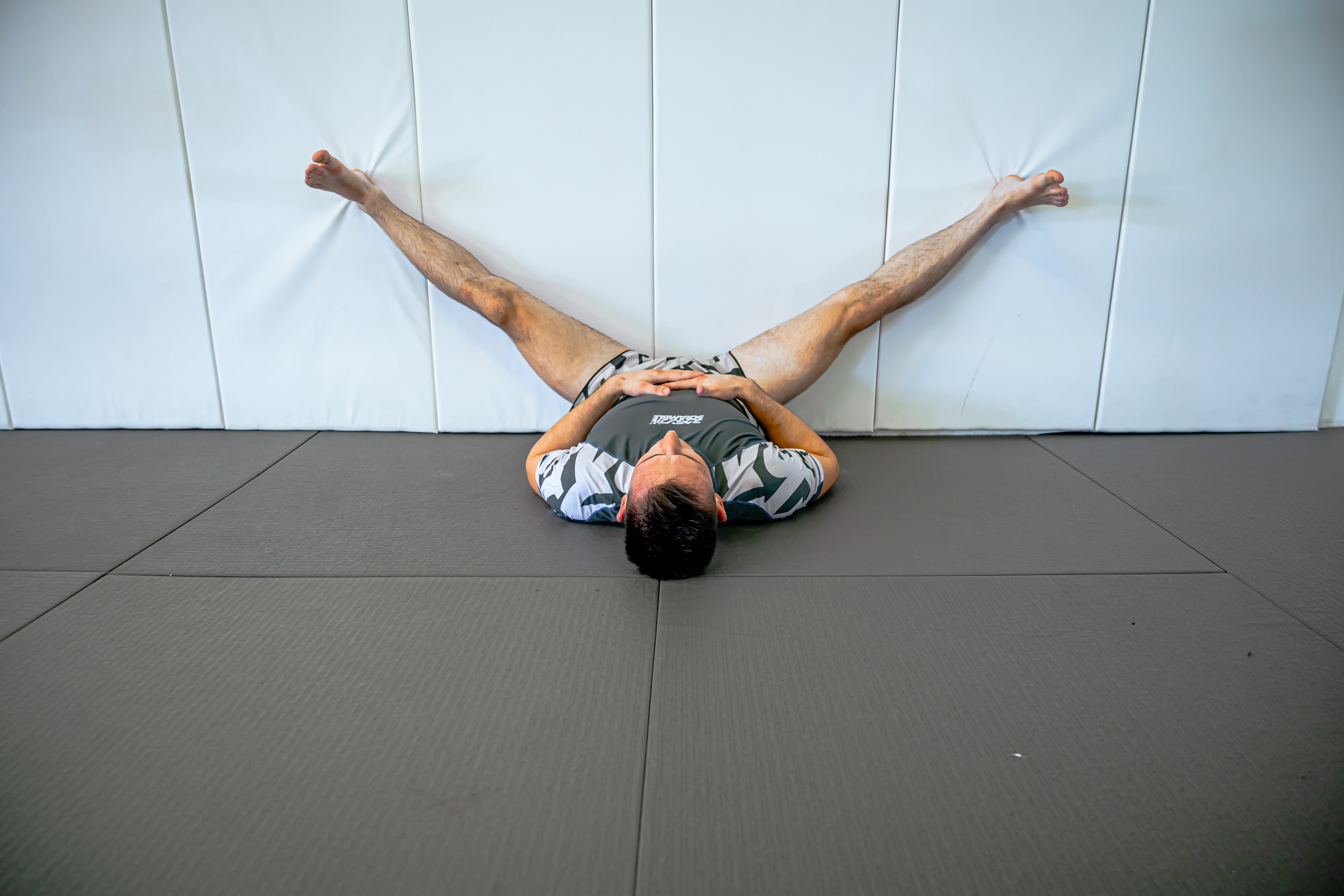 Wall straddle stretch