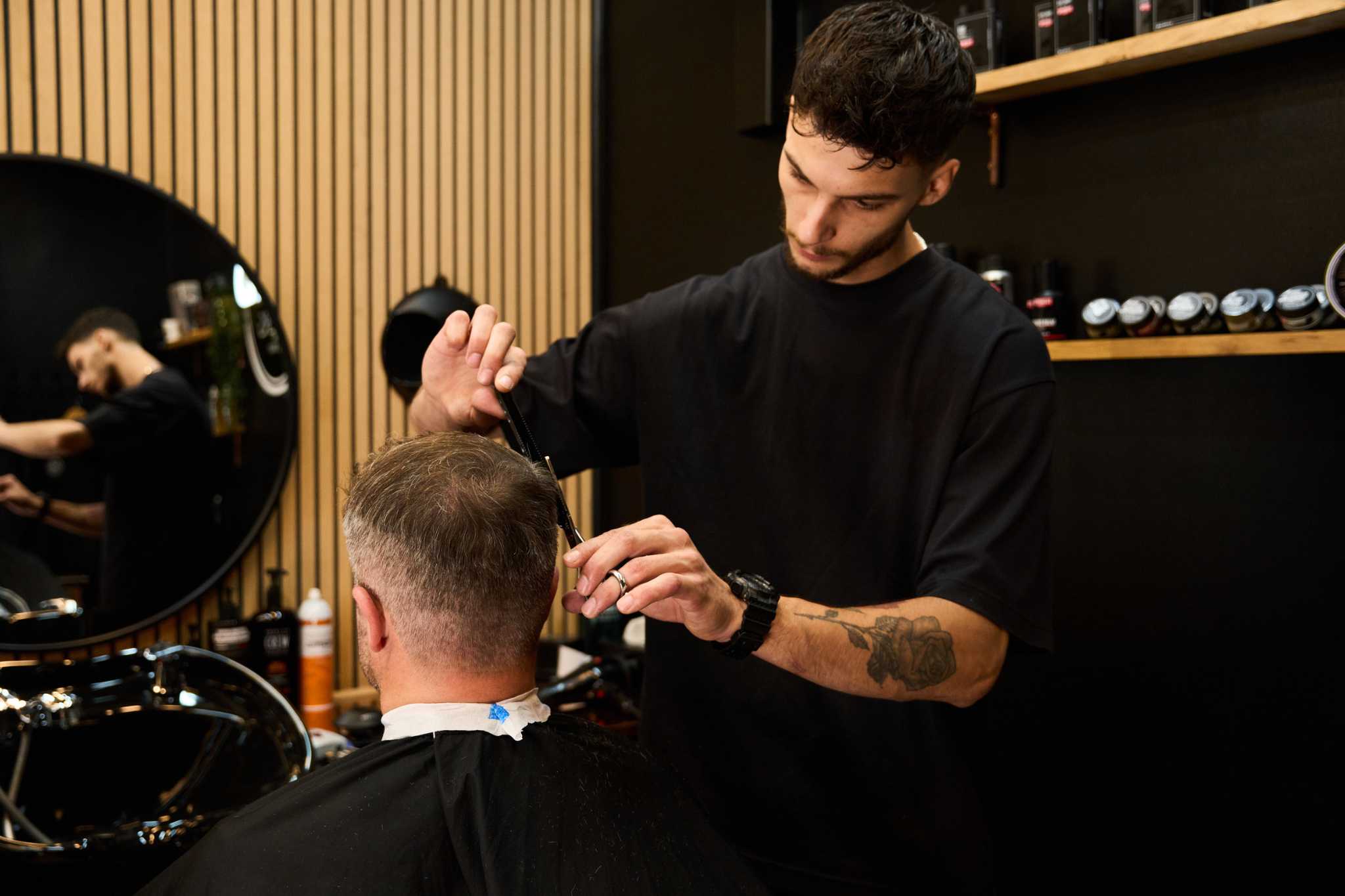 Old man getting a haircut