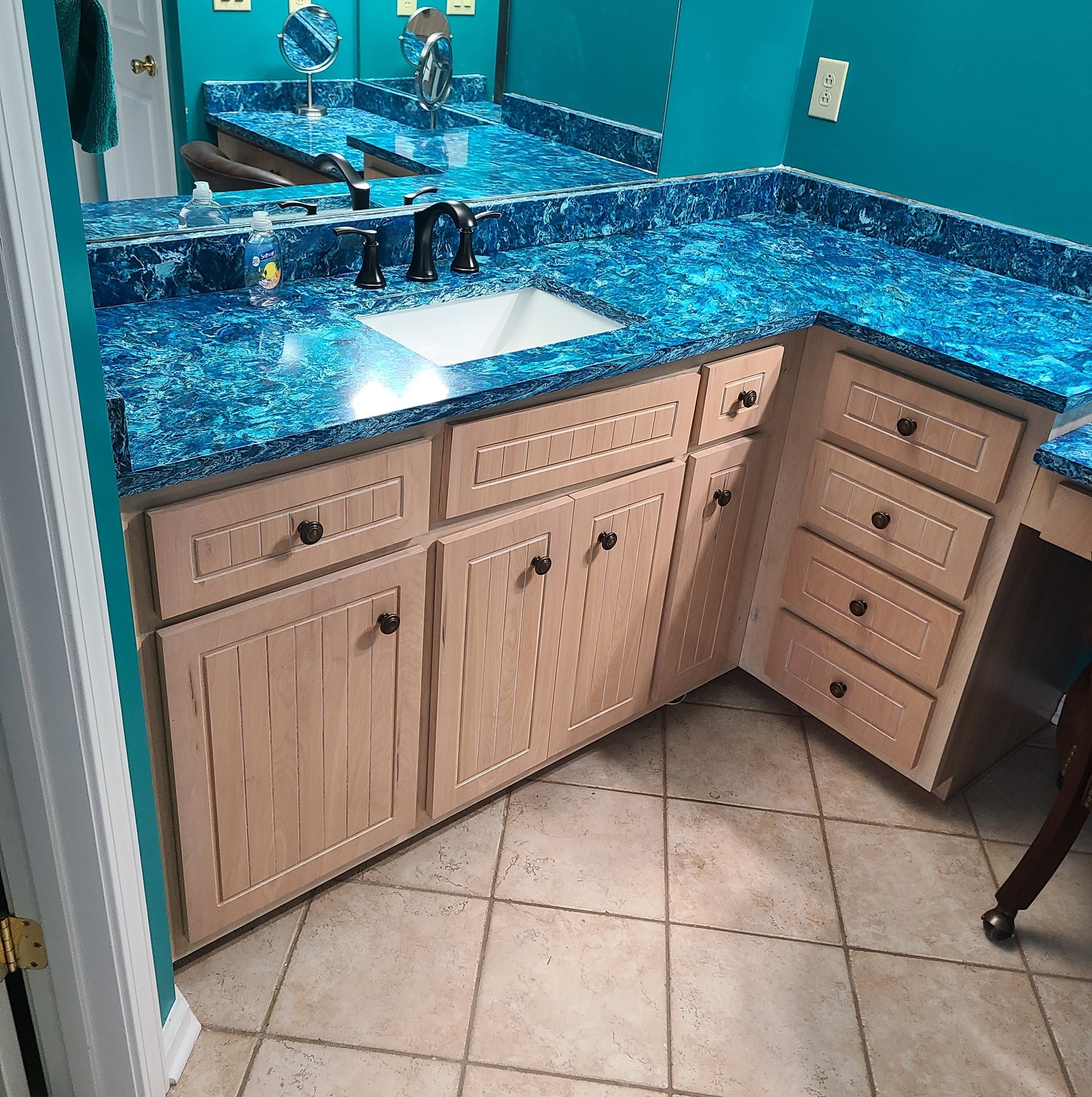 Bathroom remodeling – elegant stone vanity and fixtures