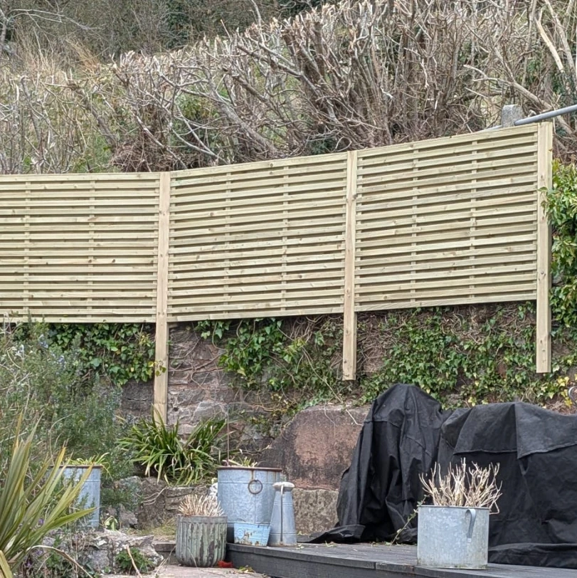 wooden fence finished being built by moore dunn fencing in torquay devon