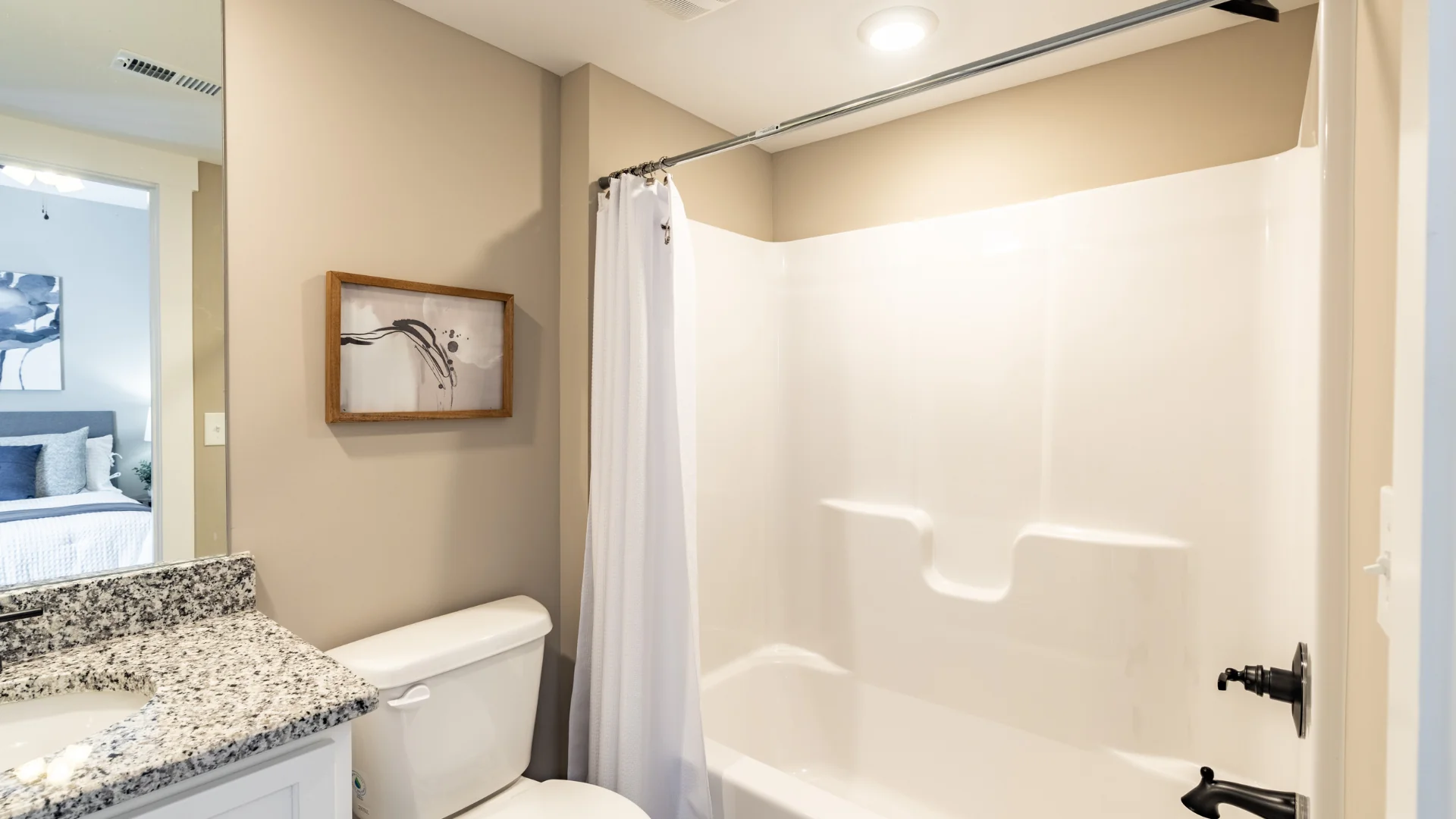 Legacy Townhomes bathroom with granite vanity, modern fixtures, and full shower in Manchester, TN townhomes.