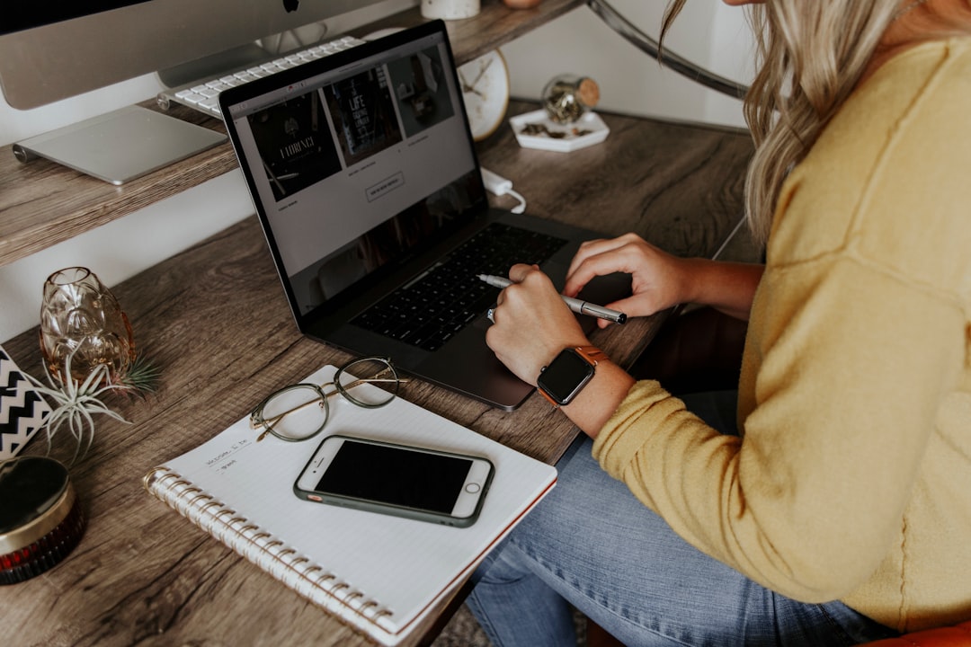 woman working on laptop at a desk