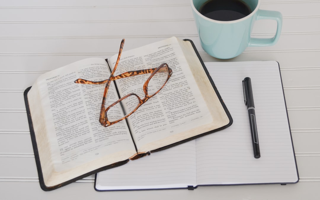 bible over, with glasses on top of it bible over, with glasses on top of it