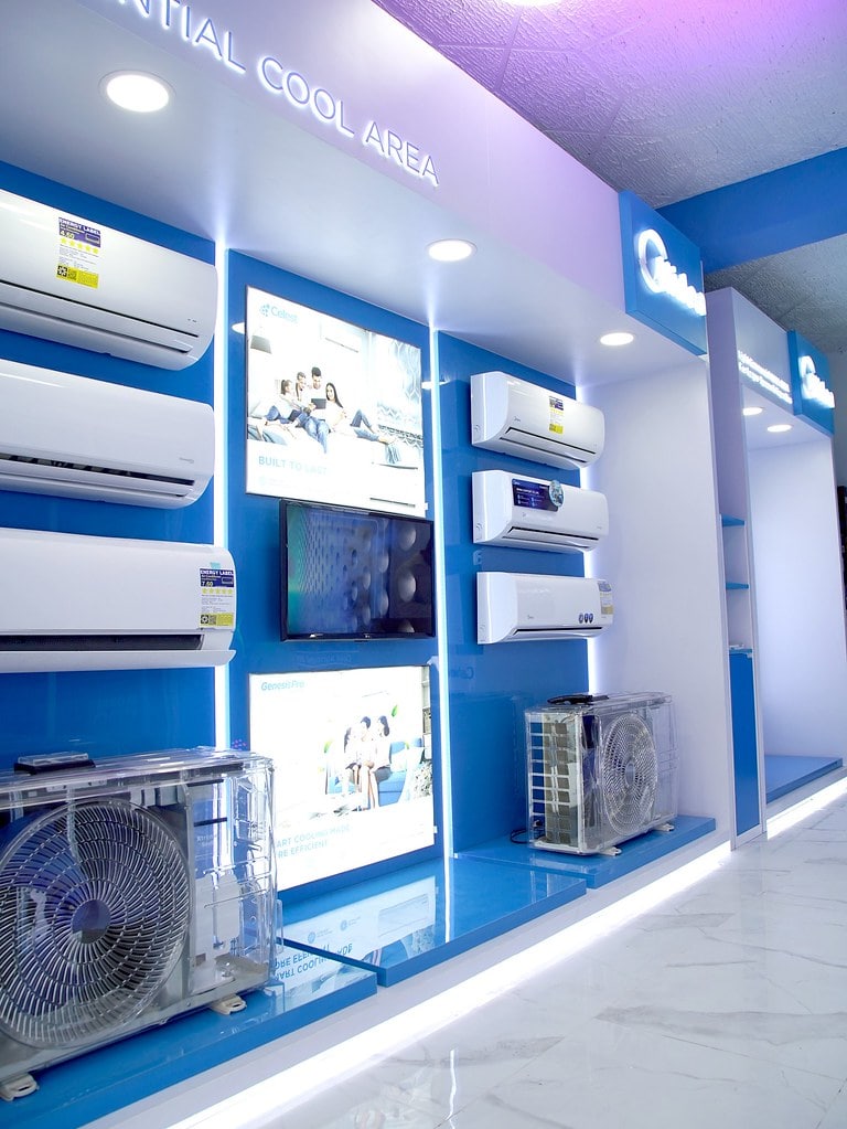 a display of air conditioners and fans