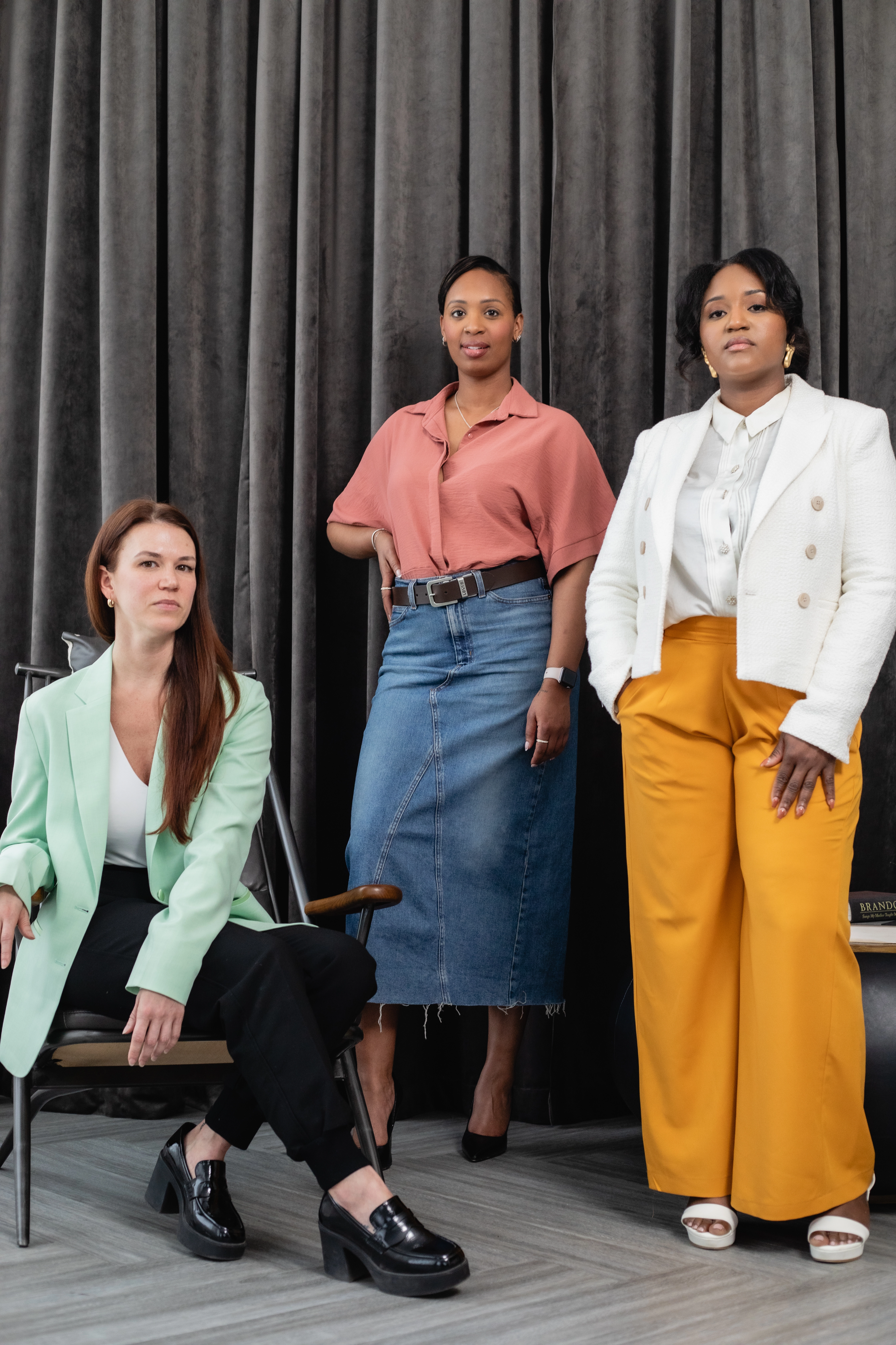 Professional women presenting at business summit