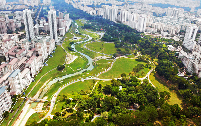 Aerial view of a well-planned urban area with integrated green spaces, water features, and sustainable infrastructure Aerial view of a well-planned urban area with integrated green spaces, water features, and sustainable infrastructure