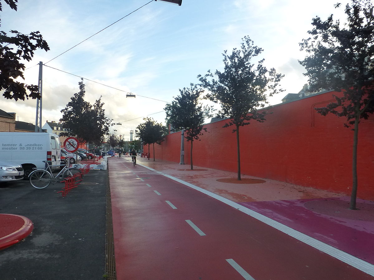 Copenhagen's well-designed cycling infrastructure with dedicated bike lanes separated from vehicular traffic, showcasing the city's commitment to sustainable transportation. Copenhagen's well-designed cycling infrastructure with dedicated bike lanes separated from vehicular traffic, showcasing the city's commitment to sustainable transportation.