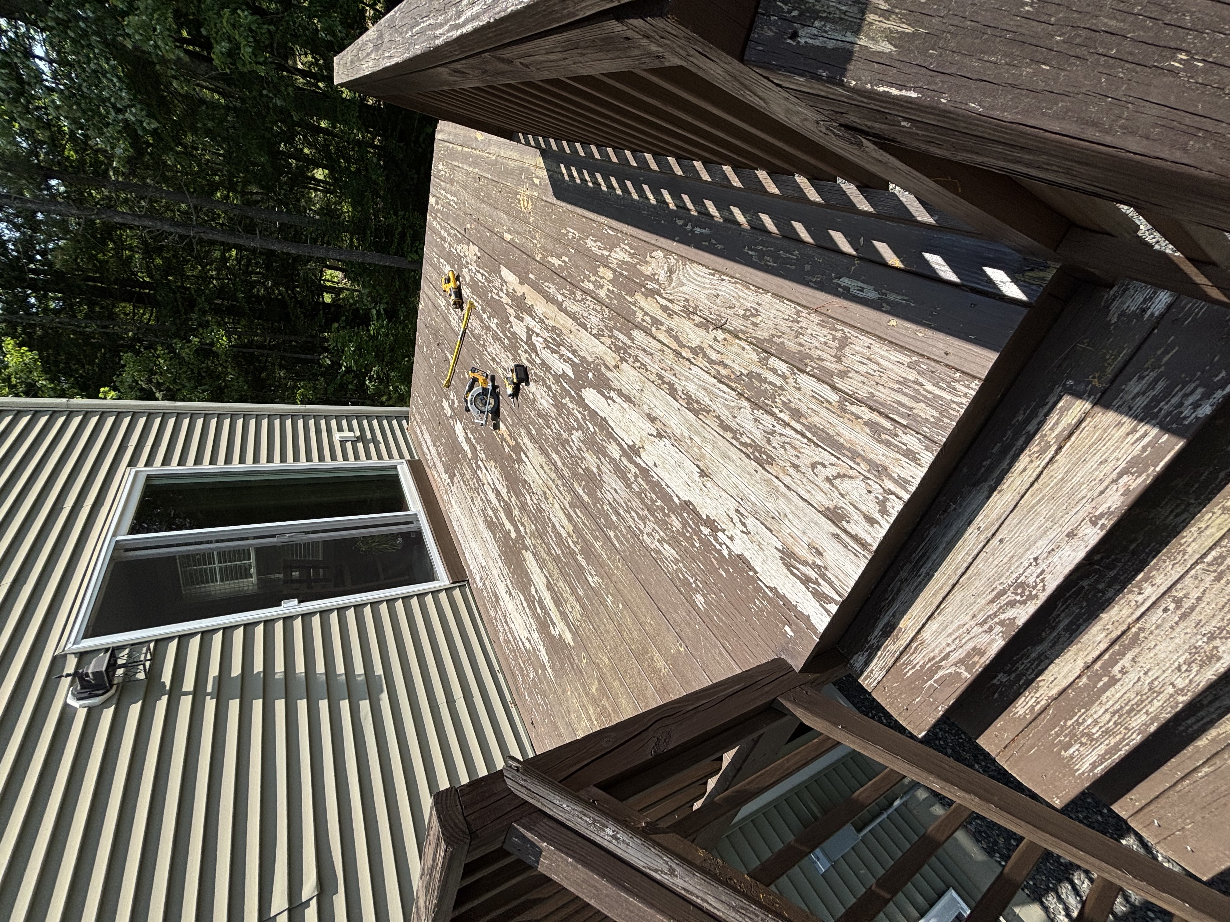 Old brown deck before removal