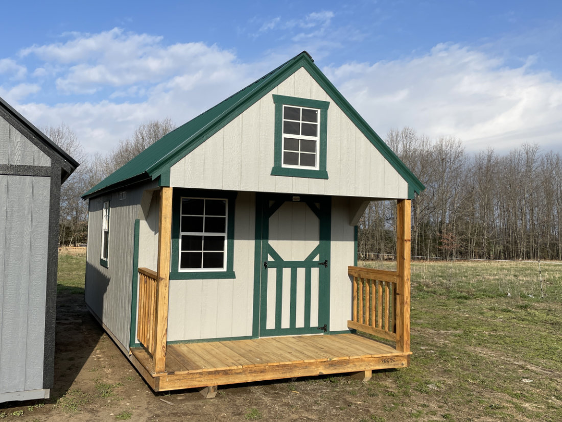 Gray and green playhouse with metal roof. For sale in Southern Missouri and North Arkansas