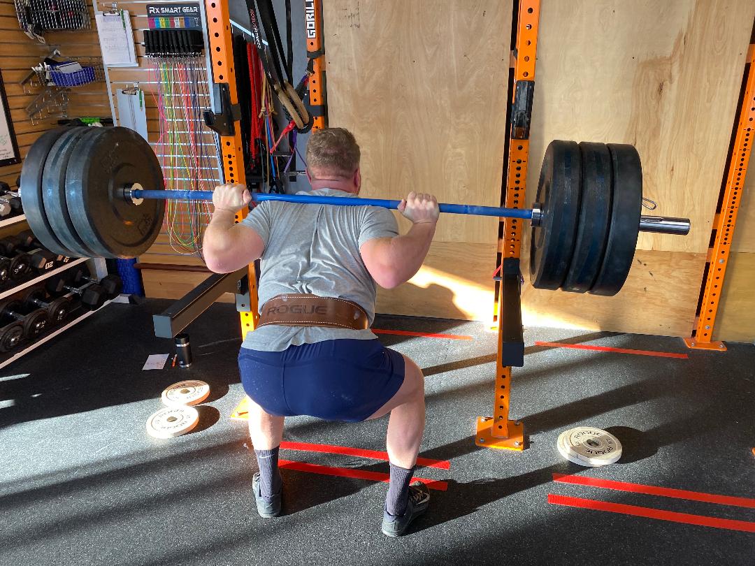 Man doing back squat