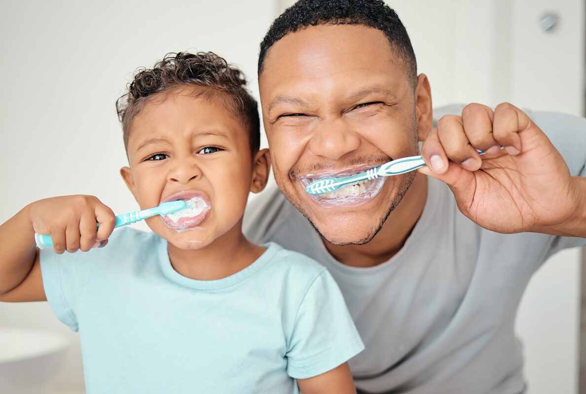 parent-leading-brushing-teeth-preventive-dental-care