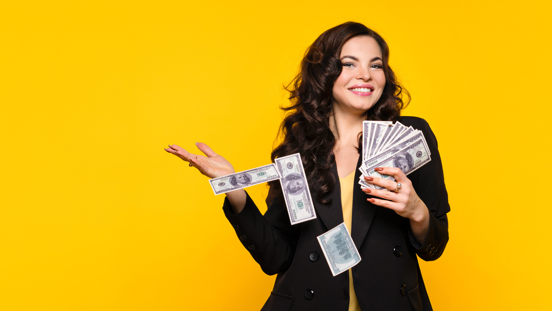 A woman happy and enjoying money