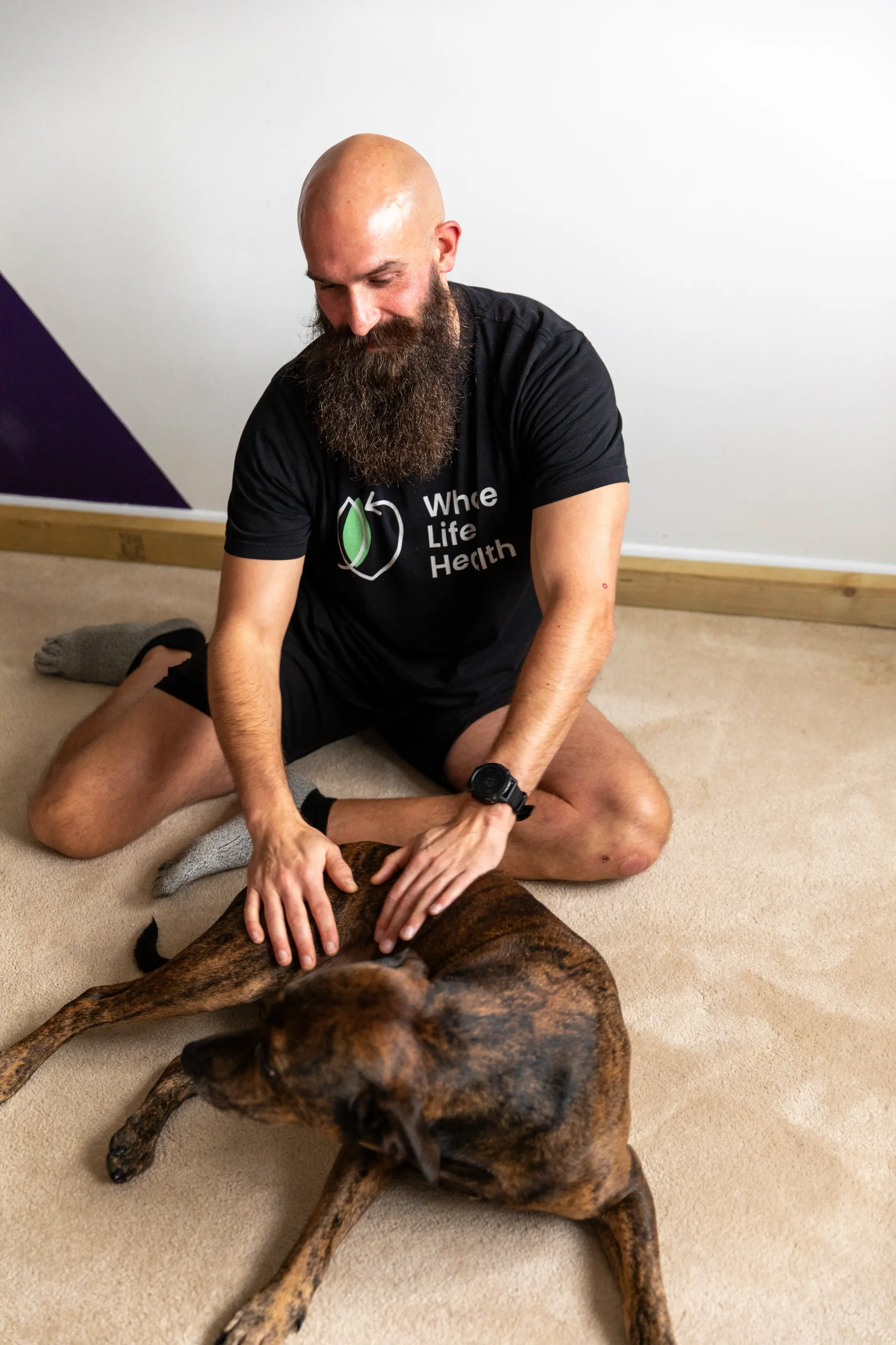 sitting on floor with dog sitting on floor with dog