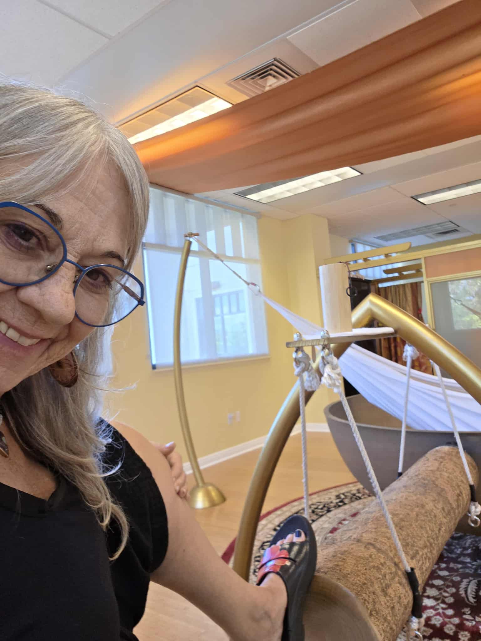 Janice Silva wellness concierge embracing nature and vitality