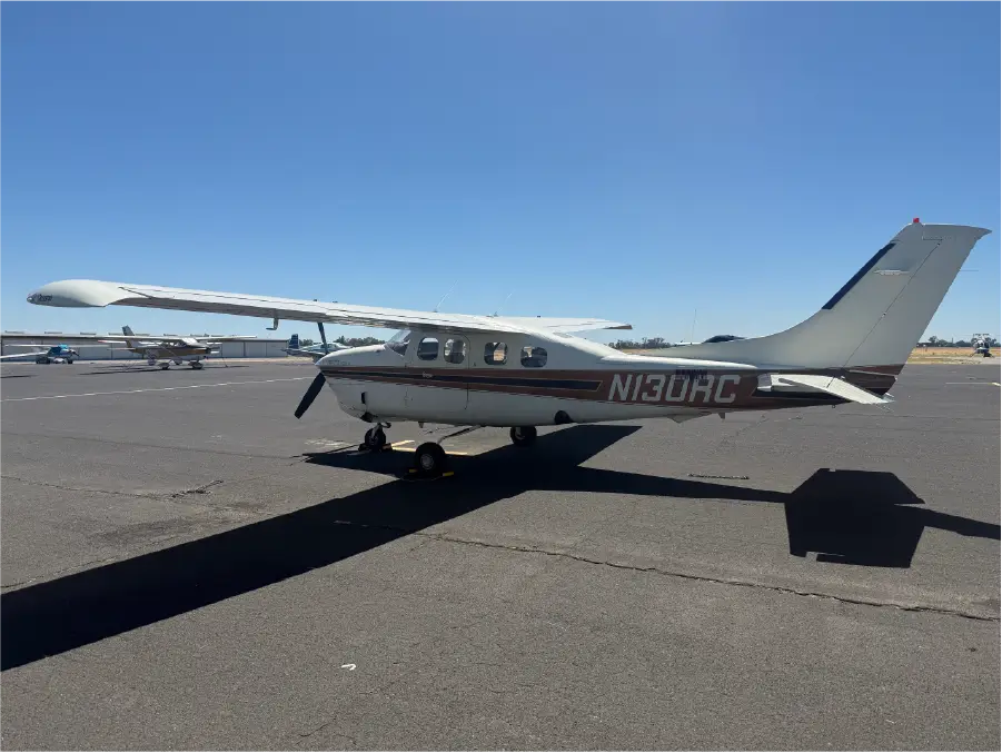 Cessna P210N - Exterior Pilot 3 QTR Back View
