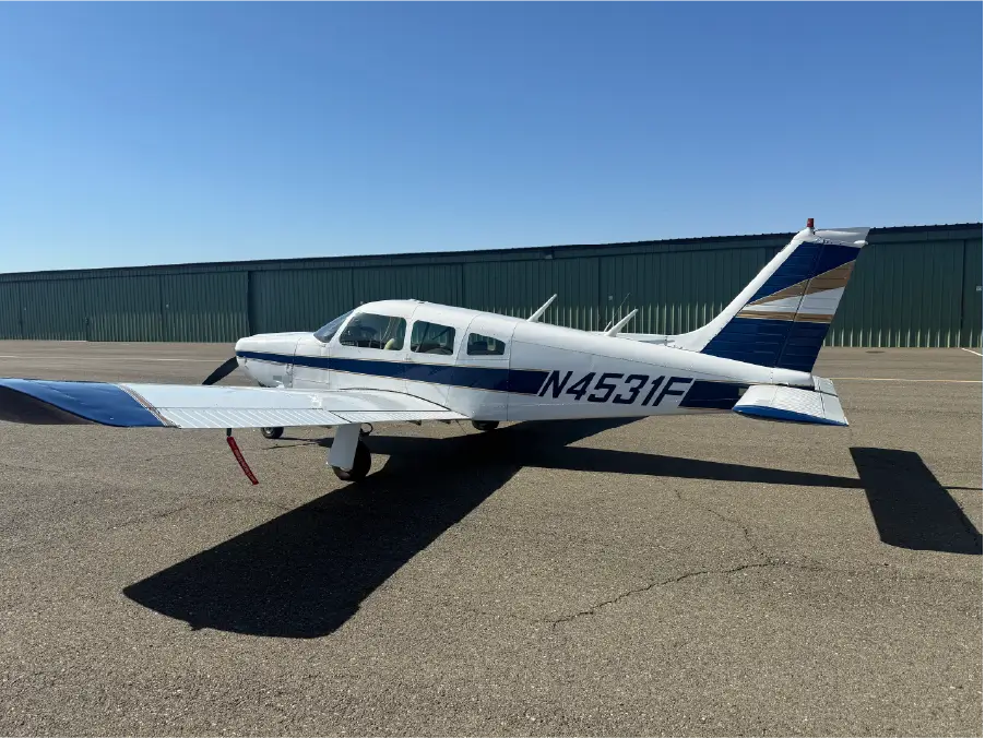 Piper Arrow - Pilot side QTR Back