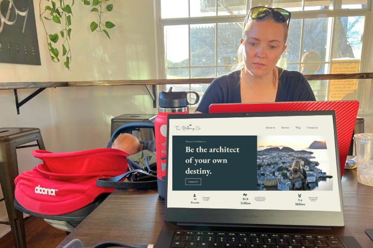 Ashley Dwyer working from home with Bellamy at her side.