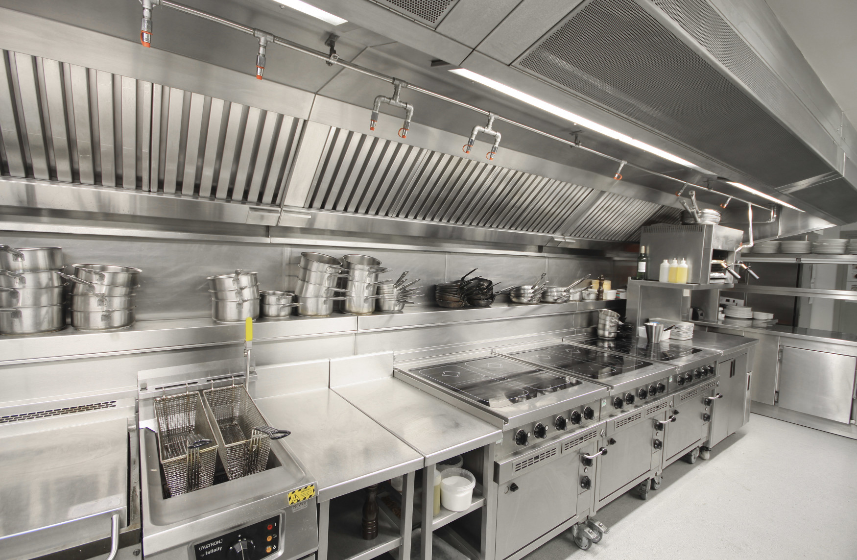 Kitchen exhaust ductwork scraped clean of grease buildup