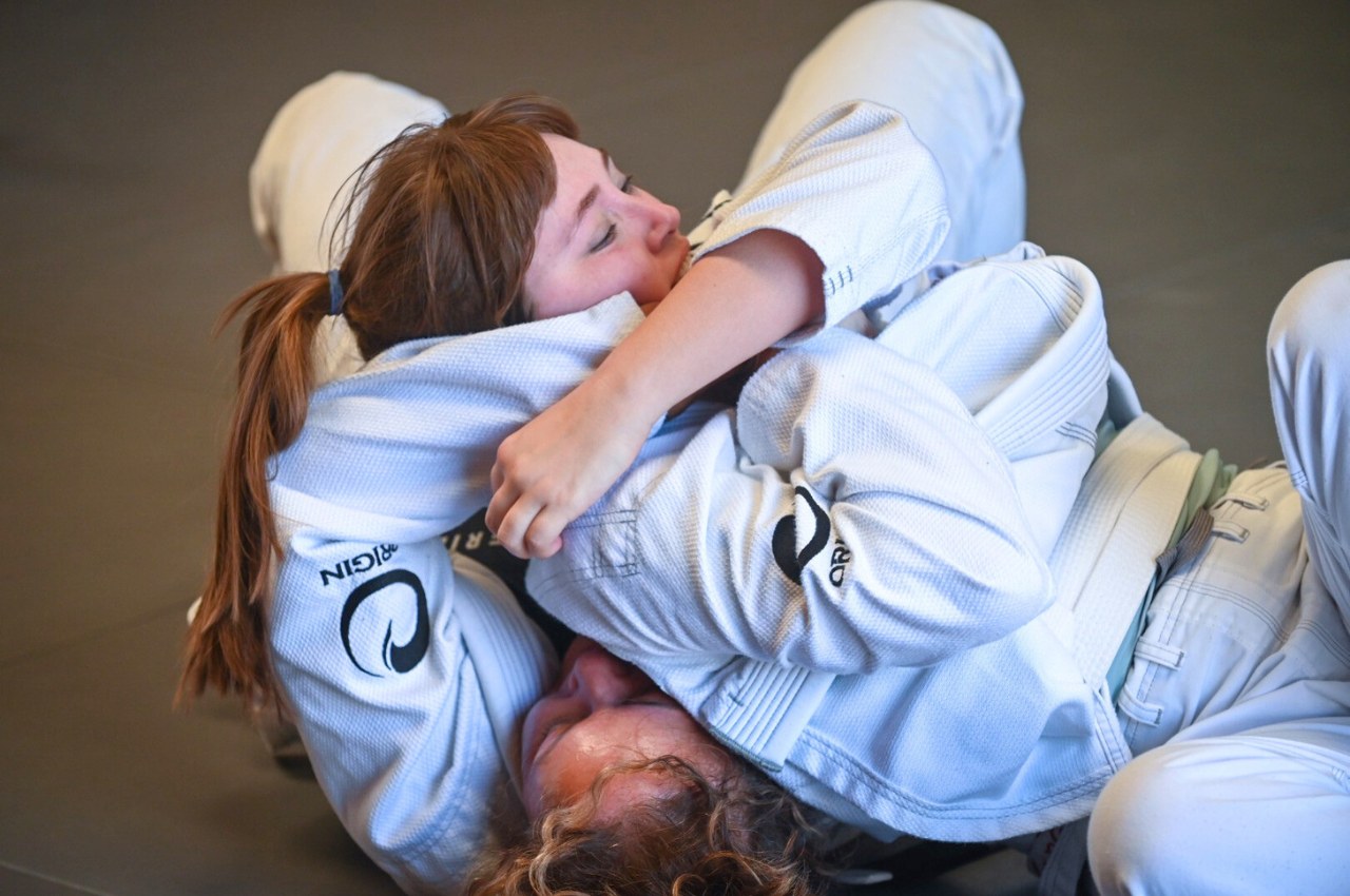 Martial arts instructor with kids