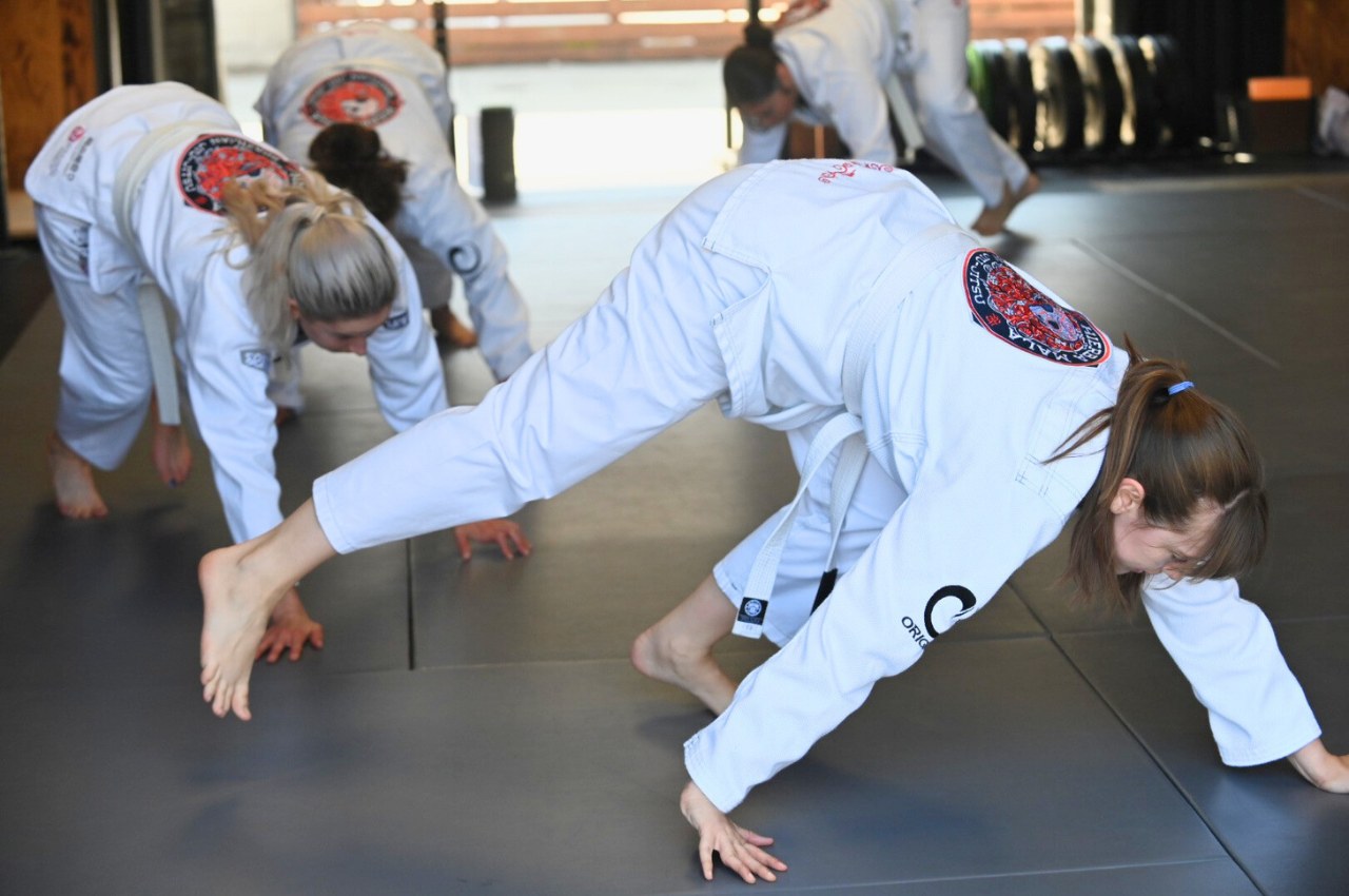 Women training BJJ