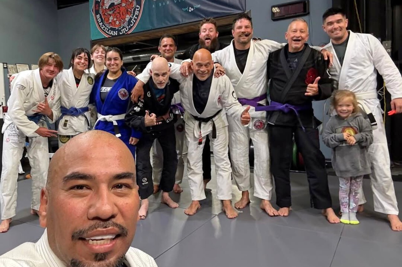 Martial arts instructor with kids