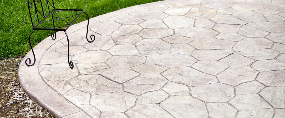 Close-up of a stamped concrete patio with decorative pattern Close-up of a stamped concrete patio with decorative pattern