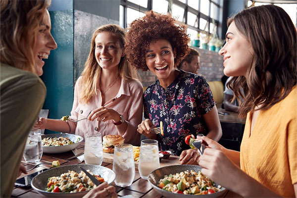 Person enjoying a colorful balanced meal mindfully Person enjoying a colorful balanced meal mindfully