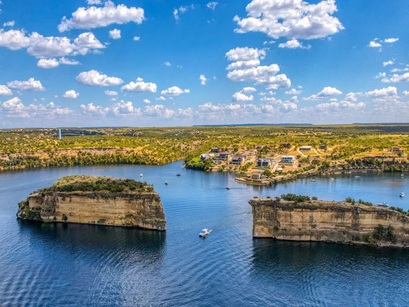 Hell's Gate rock formation cliffs rising from Possum Kingdom Lake waters