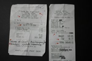 meal receipt notated for business tracking of the expense