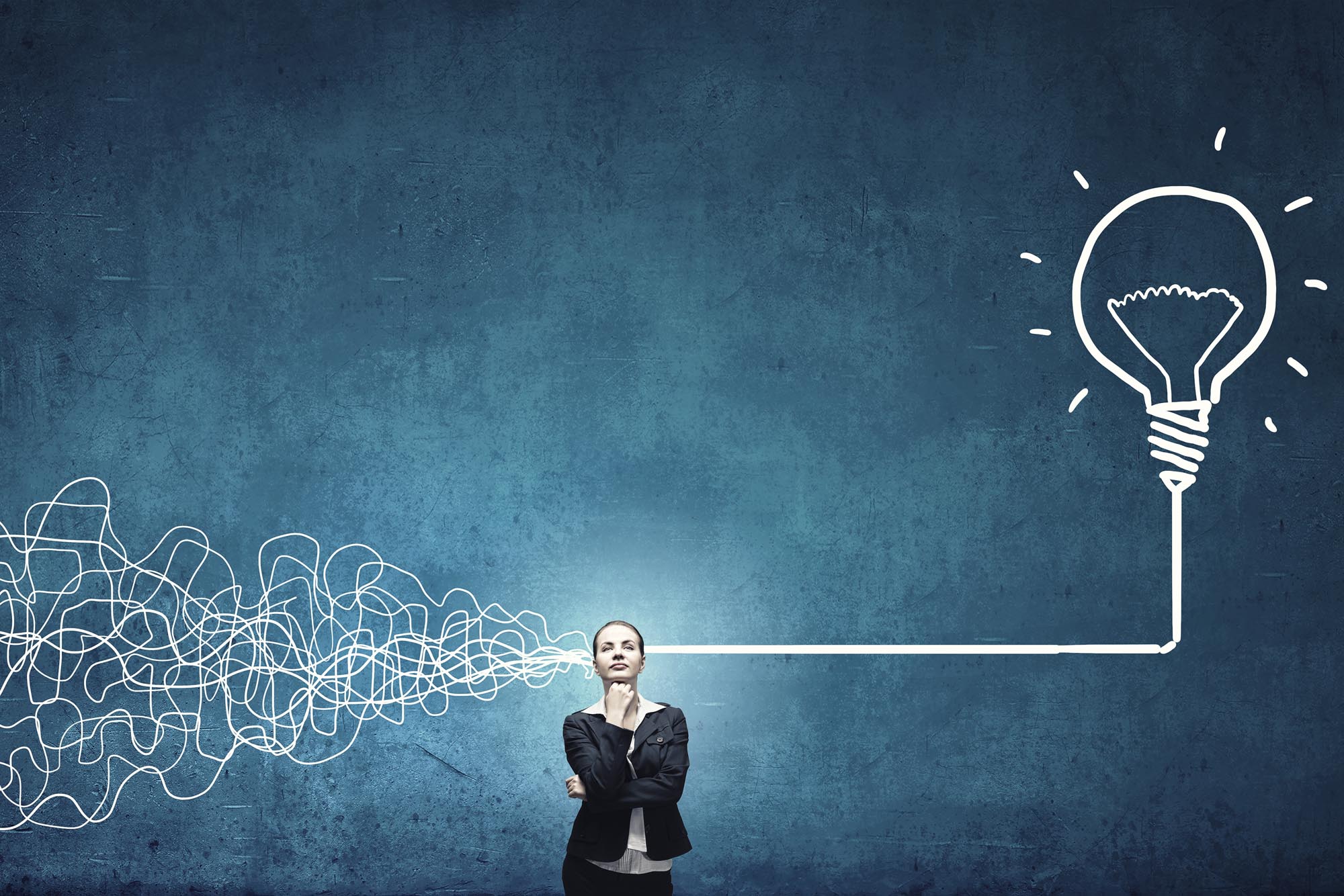 Bluish green background. Woman in middle with chin resting on her fist. To her right is a bunch of squiggly lines and it makes one straight line 'through' her brain to her left where there is a drawn lightbulb. 