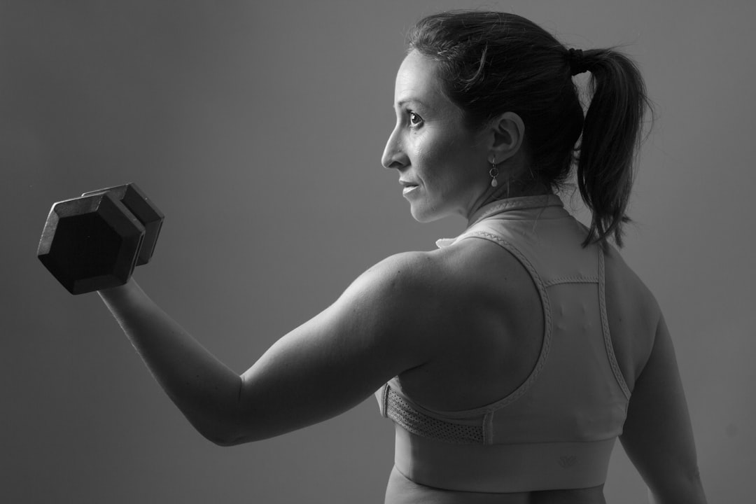 woman lifting weights woman lifting weights