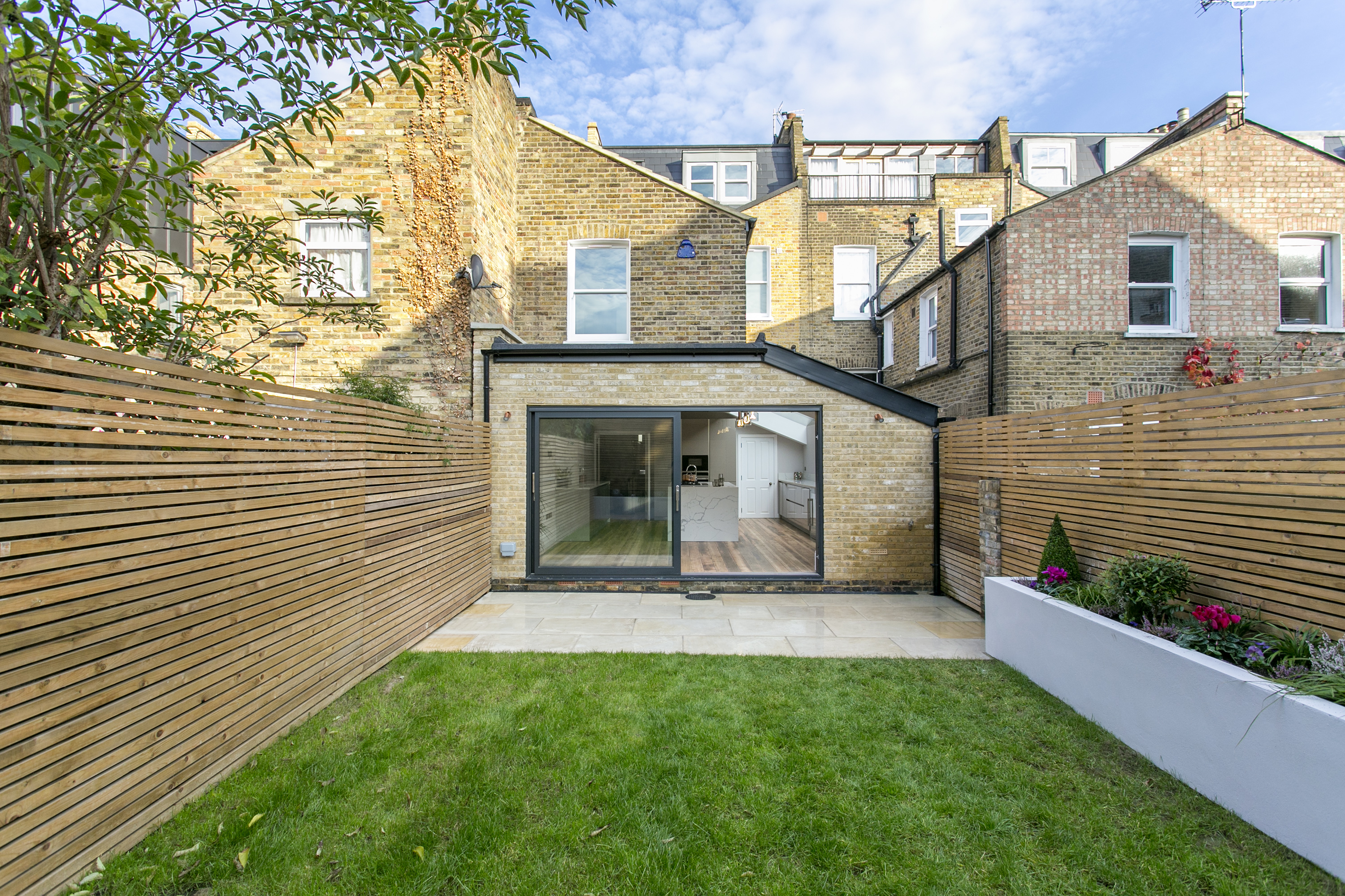 Modern Patio and Garden Area at the Rear Modern Patio and Garden Area at the Rear