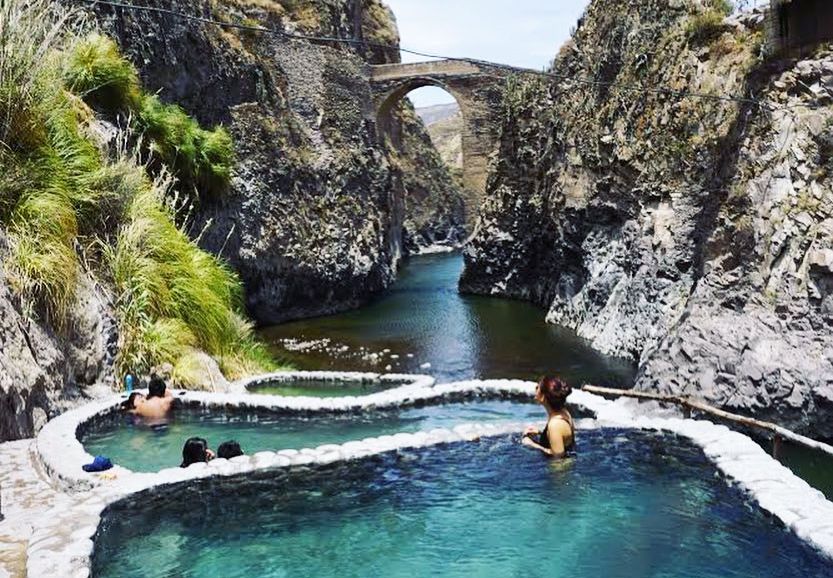 The road into Colca Canyon is not for the faint-hearted — think switchbacks, altitude, and sheer drops — but it delivers one of the most atmospheric soaks we've had. Set beside the Colca River near Yanque, these rustic pools offer a high-altitude stillness that pairs perfectly with coca tea and the occasional condor overhead. The road into Colca Canyon is not for the faint-hearted — think switchbacks, altitude, and sheer drops — but it delivers one of the most atmospheric soaks we've had. Set beside the Colca River near Yanque, these rustic pools offer a high-altitude stillness that pairs perfectly with coca tea and the occasional condor overhead.