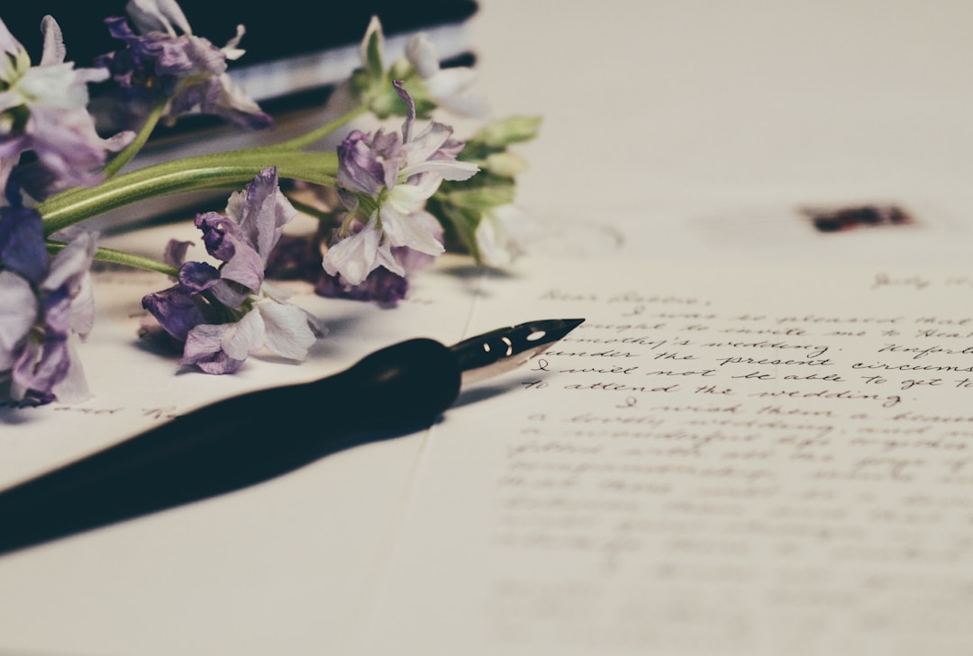 Pen with paper and flowers Pen with paper and flowers